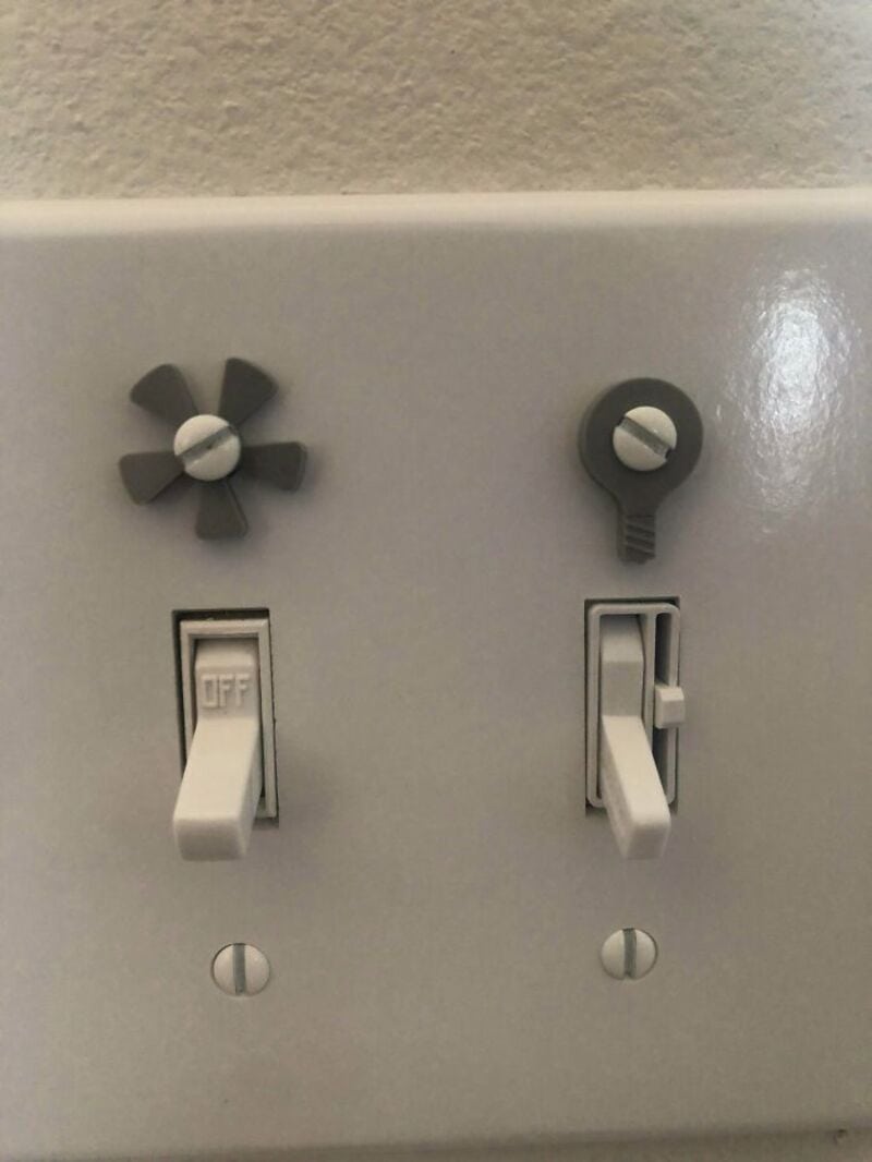 Electrical outlet with custom switch and knob, part of 'functional-3d-print-pic' post.