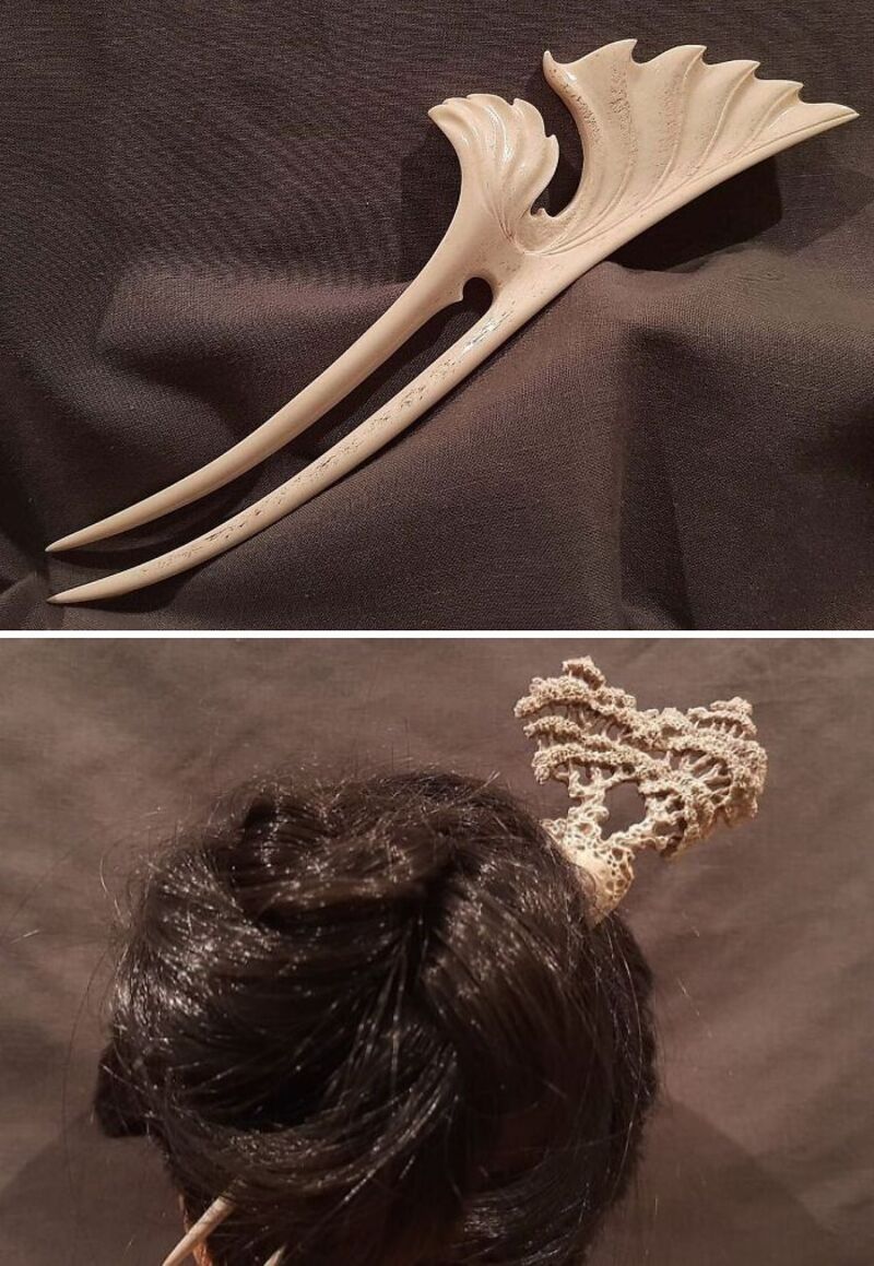 Decorative seashell and hair accessory made from coral and hair.