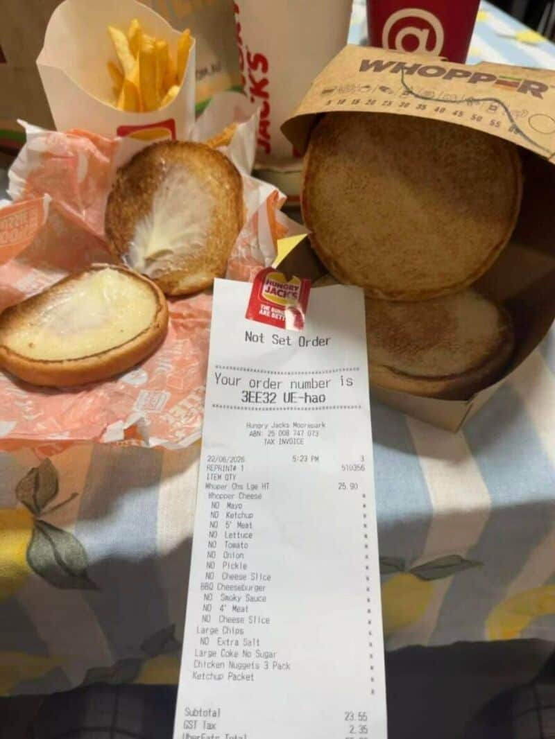 Fast food meal with burger bun, fries, and a receipt from Burger King.