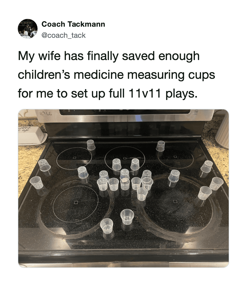 Children's medicine measuring cups used to set up 11v11 plays on stove.