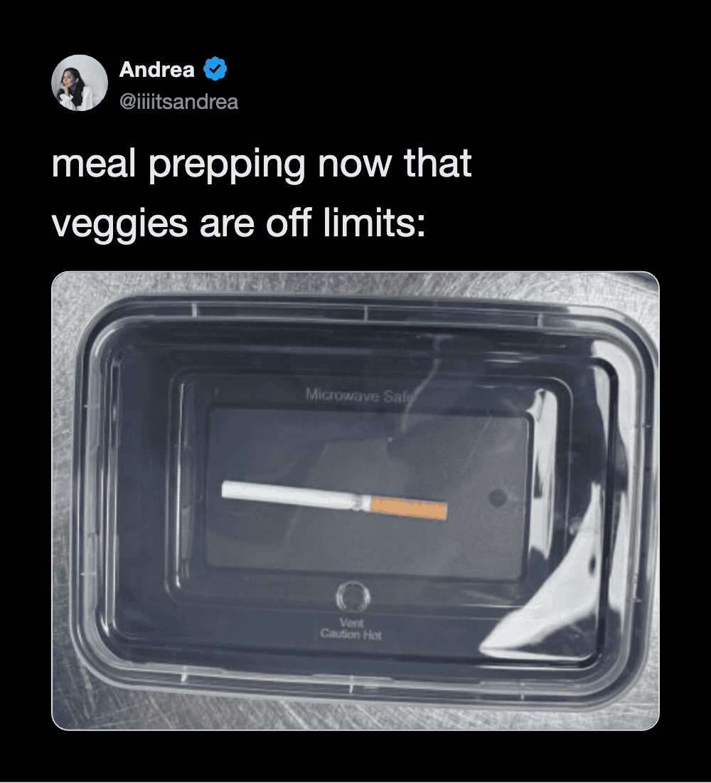 Meal prepping with a cigarette in a microwave, captioned by Andrea.