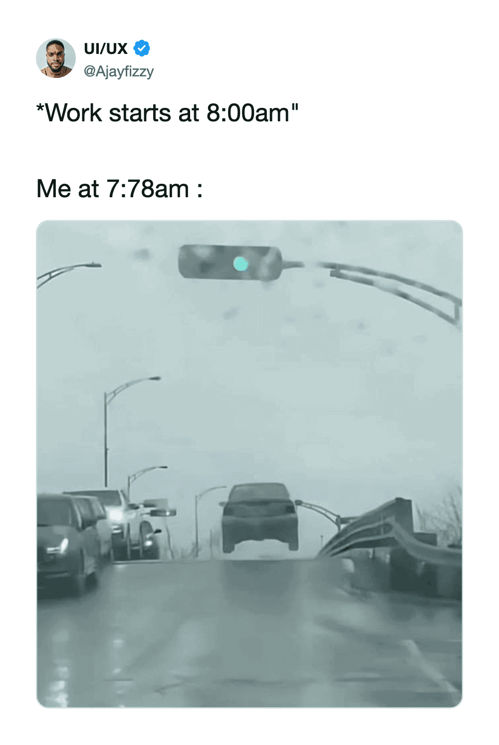Car on flooded road at 7:28am, before work starts at 8:00am.