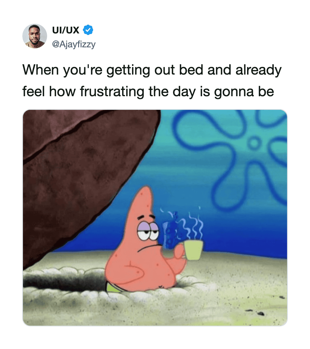 Patrick from SpongeBob holding a cup, looking frustrated, under a rock.