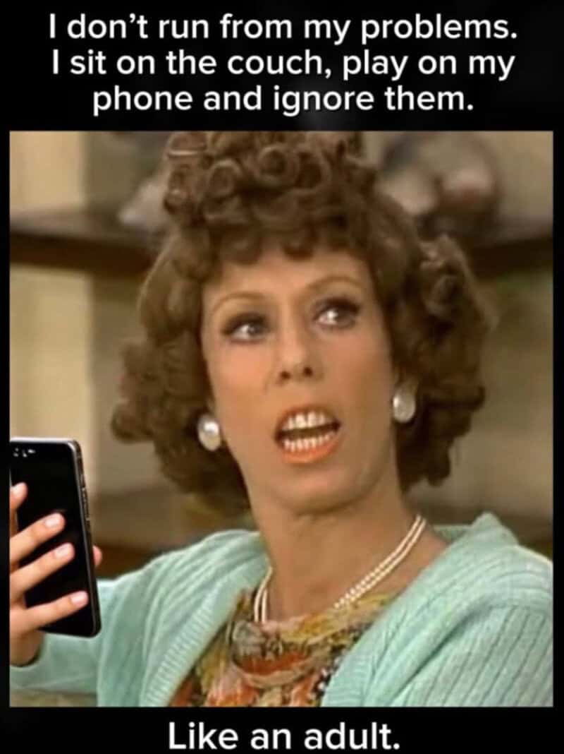 Woman with curly hair looking annoyed, holding a phone, with text about ignoring problems.