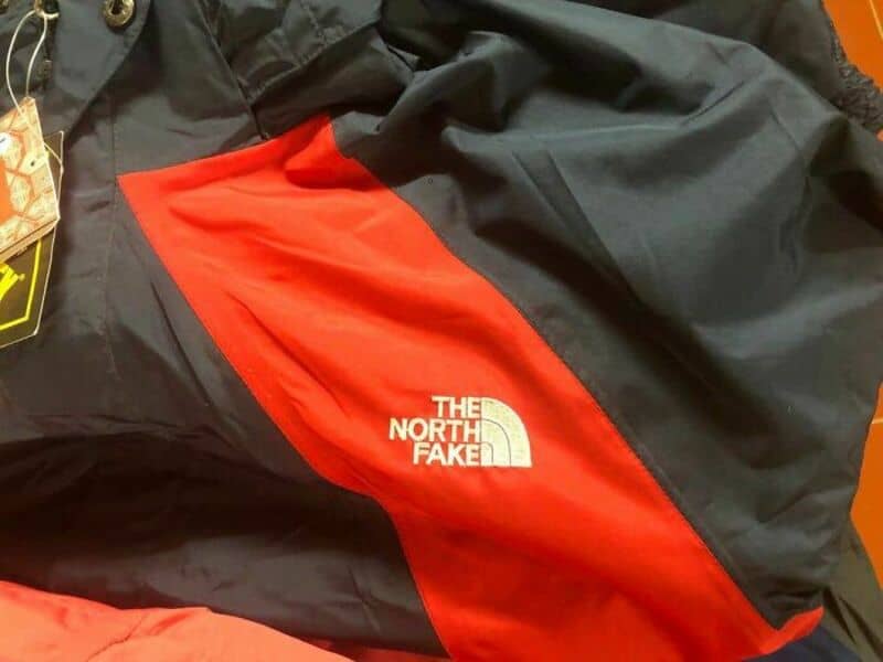 The North Fake logo on a black and red jacket.