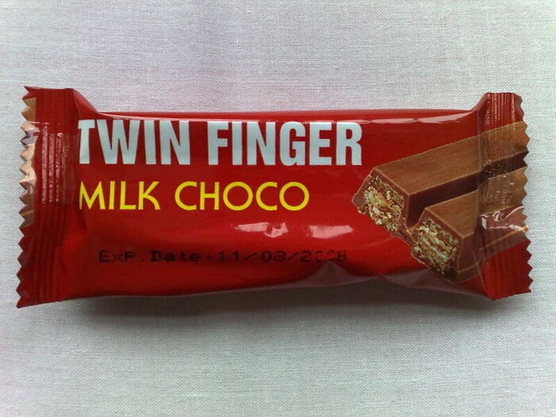 Twin Finger Milk Choco candy bar with an image of the chocolate bar on the wrapper.