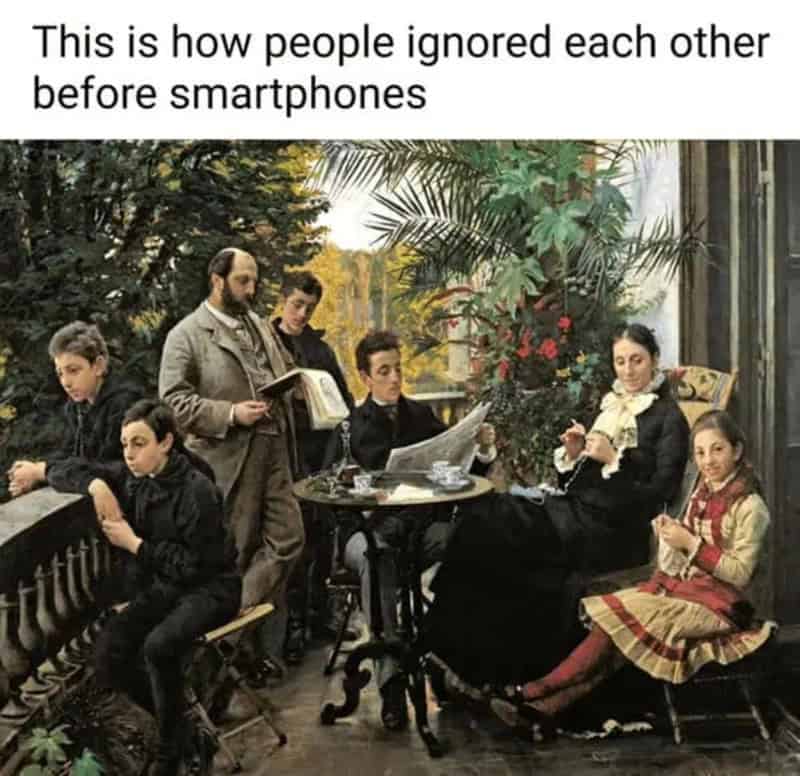 People ignoring each other while using smartphones in a vintage-style room.