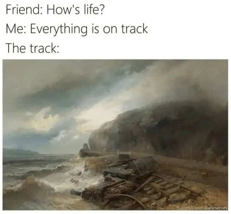 A train wreck on a stormy coast with dark clouds and rough seas.