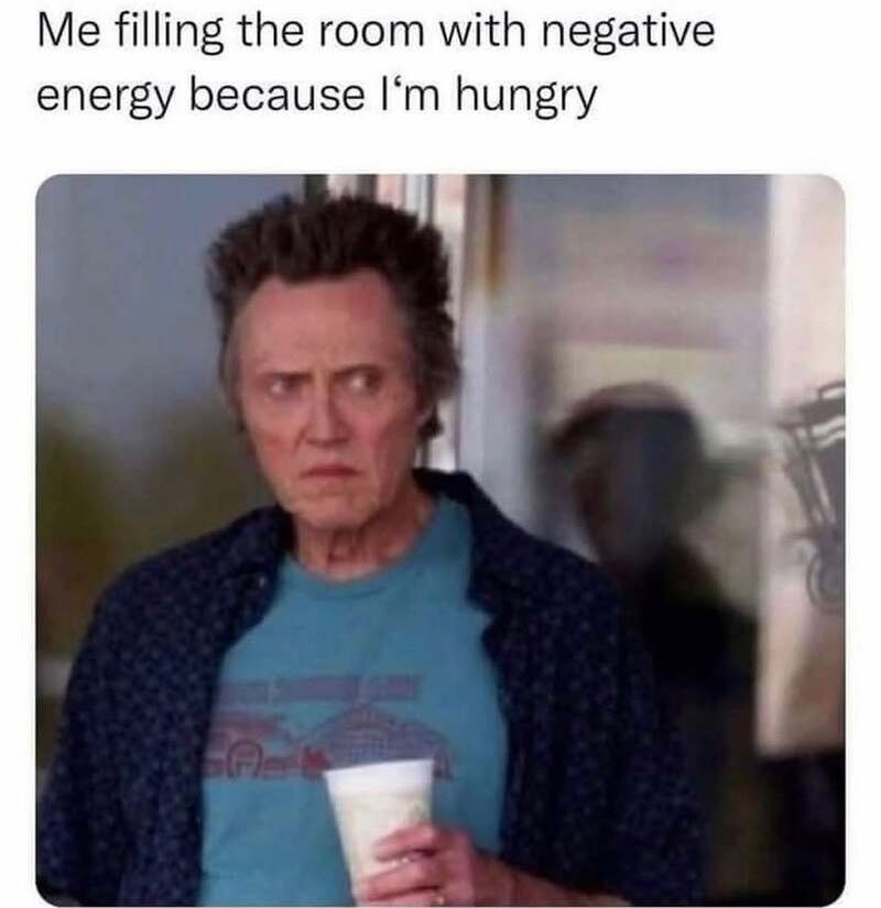 Woman with a confused expression holding a cup, caption about filling room with negative energy.