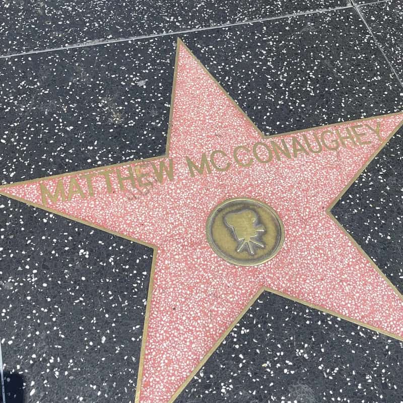Star on Hollywood Walk of Fame for Matthew McConaughey with pink glitter background.