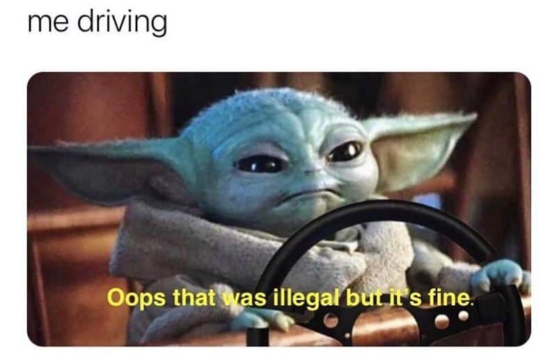 Baby Yoda driving with a caption about illegal driving but it's fine.
