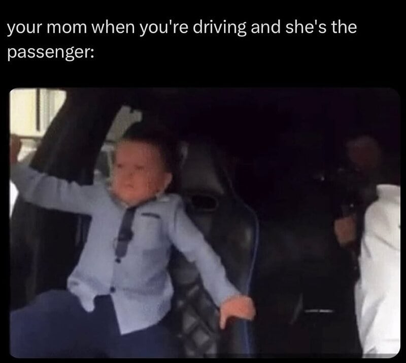 Child with a serious face sitting in a car, with caption about mom driving.