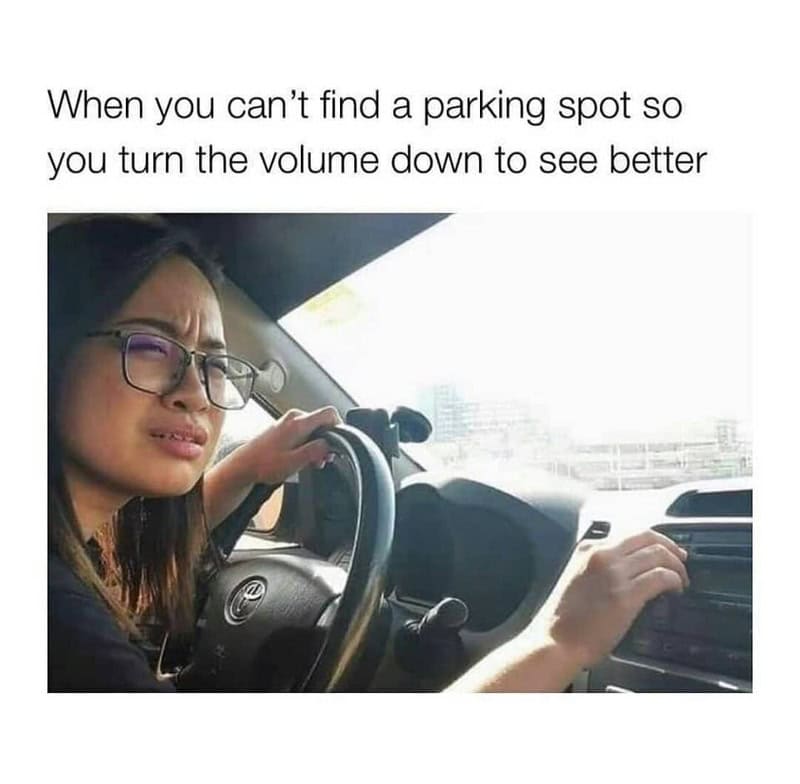Woman turning volume down in car to see better, with text about parking spots.
