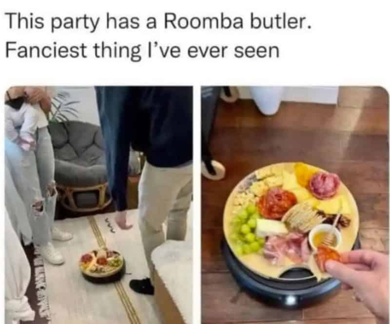 Party with a Roomba butler serving food, funny scene from a gathering.