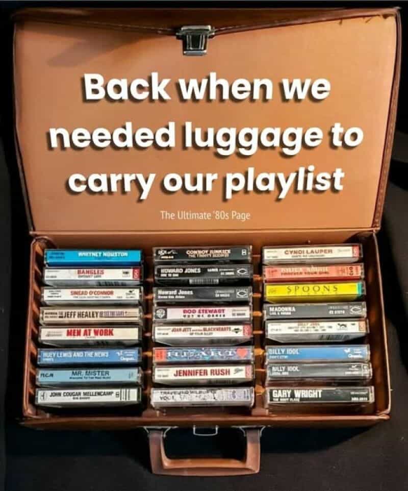 Box of 80s music cassette tapes with the caption 'Back when we needed luggage to carry our playlist'.