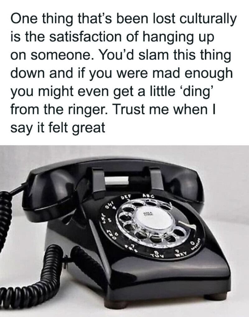 Vintage black rotary phone with a quote about cultural loss and satisfaction.