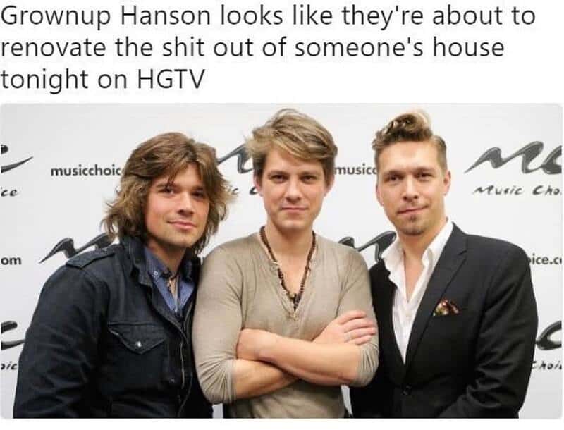 Three men standing together, one with arms crossed, at Music Choice event.