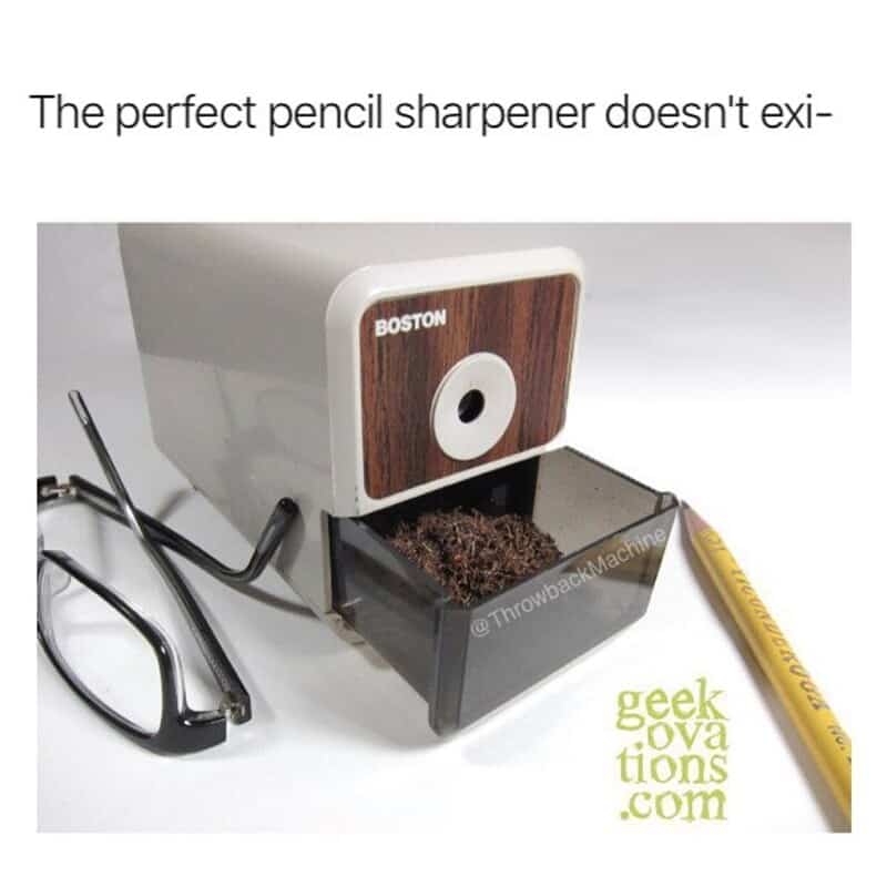 Pencil sharpener with a wood finish and a small container of shavings.