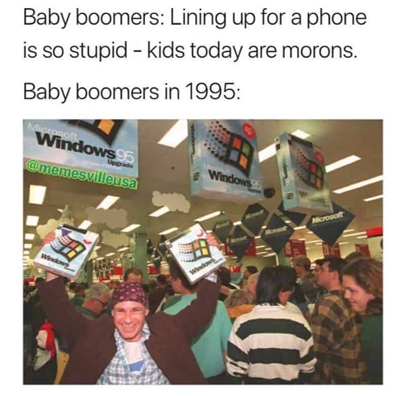 Baby boomers in 1995 with Windows 95 boxes hanging from the ceiling.