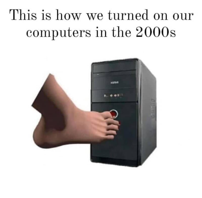 Foot pressing a power button on a 2000s desktop computer with text about turning on computers in the.
