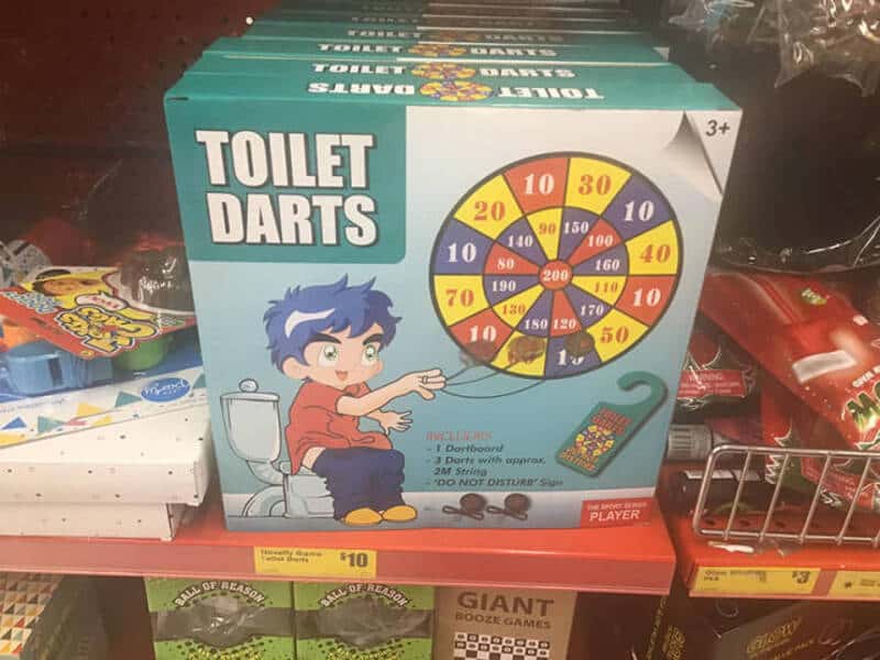 Toilet Darts game with a boy aiming at a dartboard on the box.