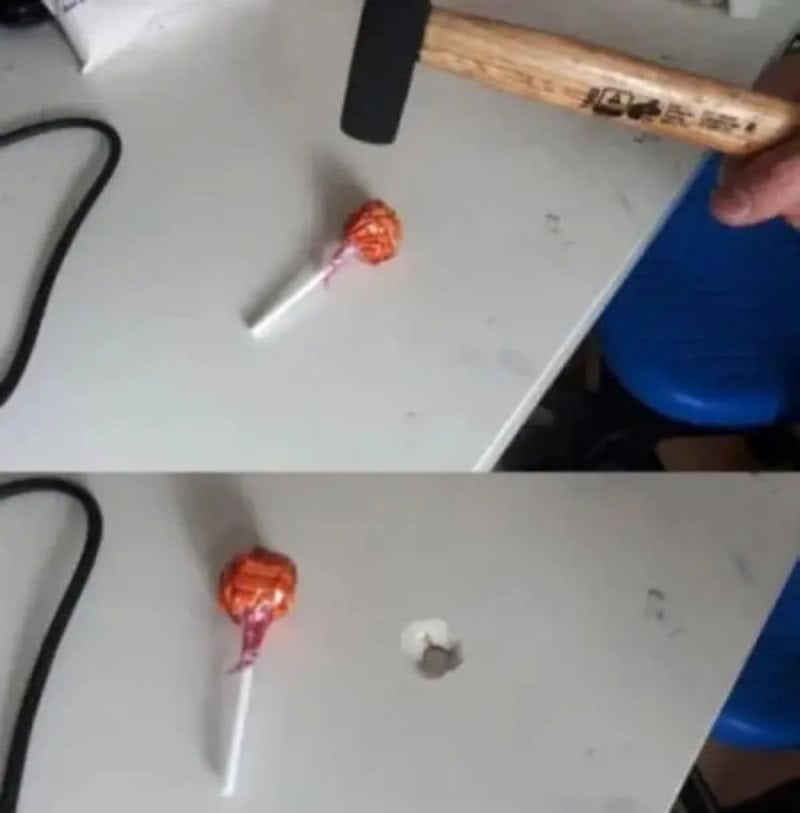Hammer hitting a lollipop, causing it to break in half.