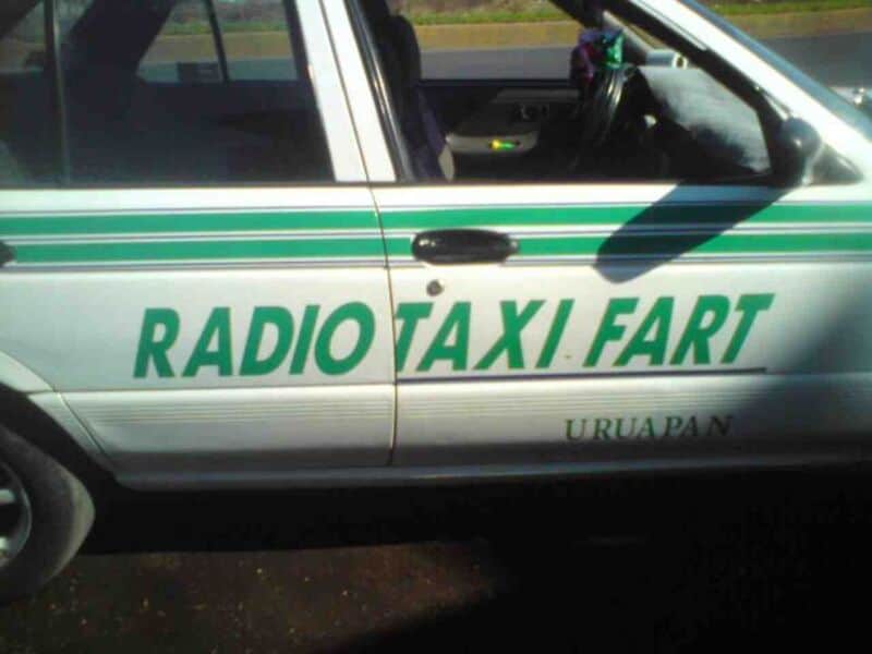 Radio Taxi Fart vehicle with green stripes and text on the side.