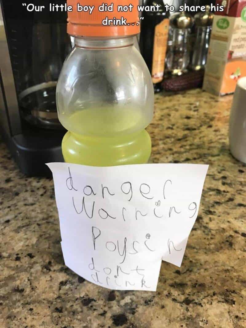 Warning sign on a bottle says 'danger warning poison don't drink' with a note saying 'dancer warning.