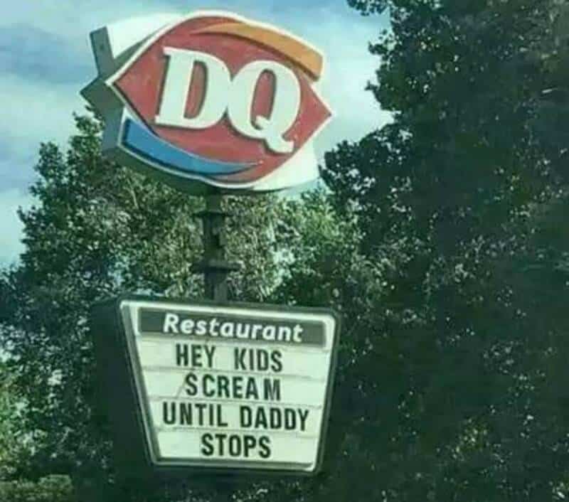 Dairy Queen sign with a humorous message about kids and dads.