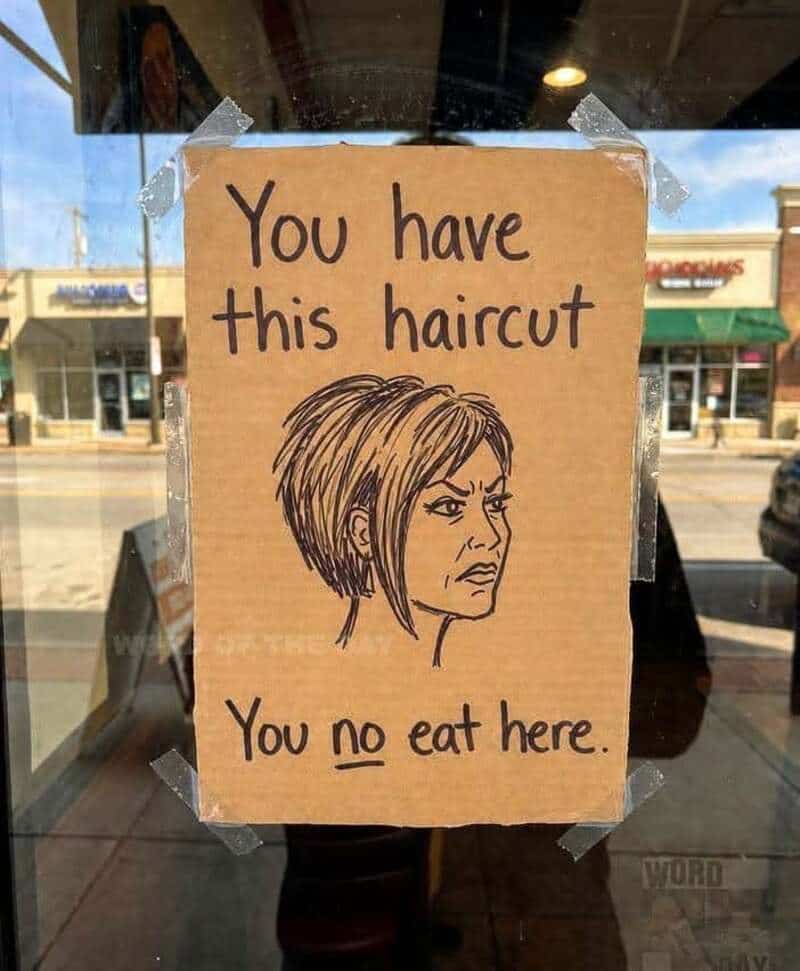 Sign says you have this haircut, you no eat here, with a drawing of a woman with a short hairstyle.