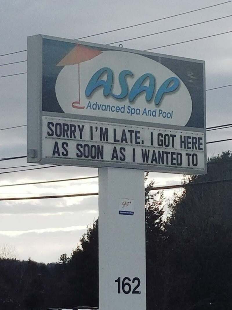 Sign for ASAE Advanced Spa and Pool with humorous message about being late.