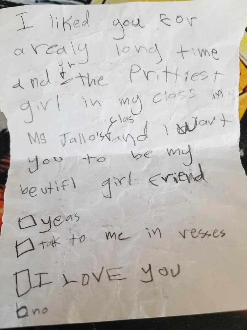 Handwritten love note on paper with checkboxes and a heart symbol.