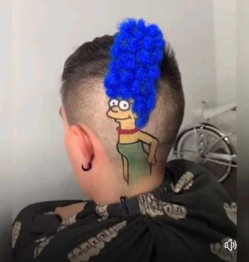 Person with a tattoo of Marge Simpson's hair and face on the back of their head.