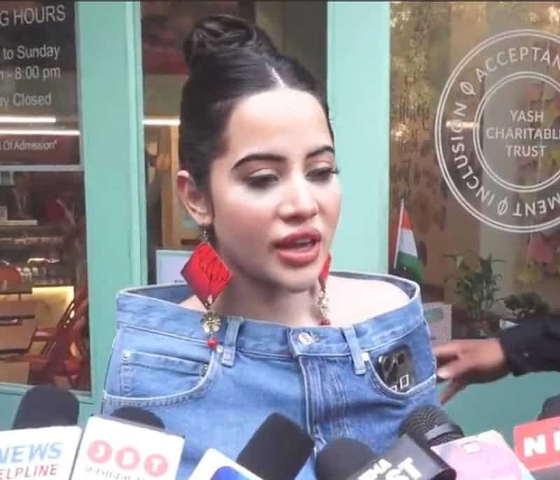 Young woman speaking to media outside Yash Charitable Trust.
