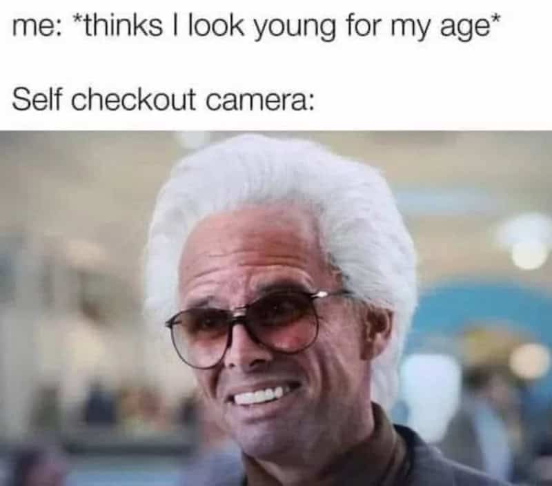 Self checkout meme with a man smiling and wearing sunglasses.