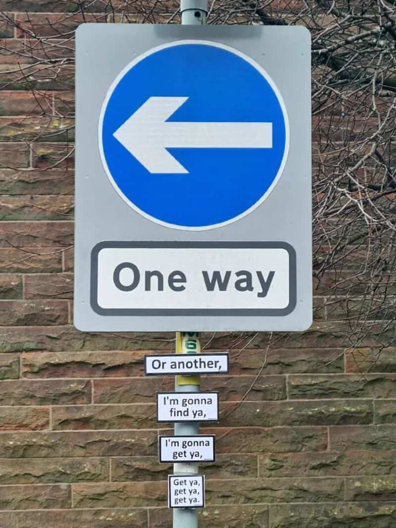 One way sign with humorous text below it about finding someone.