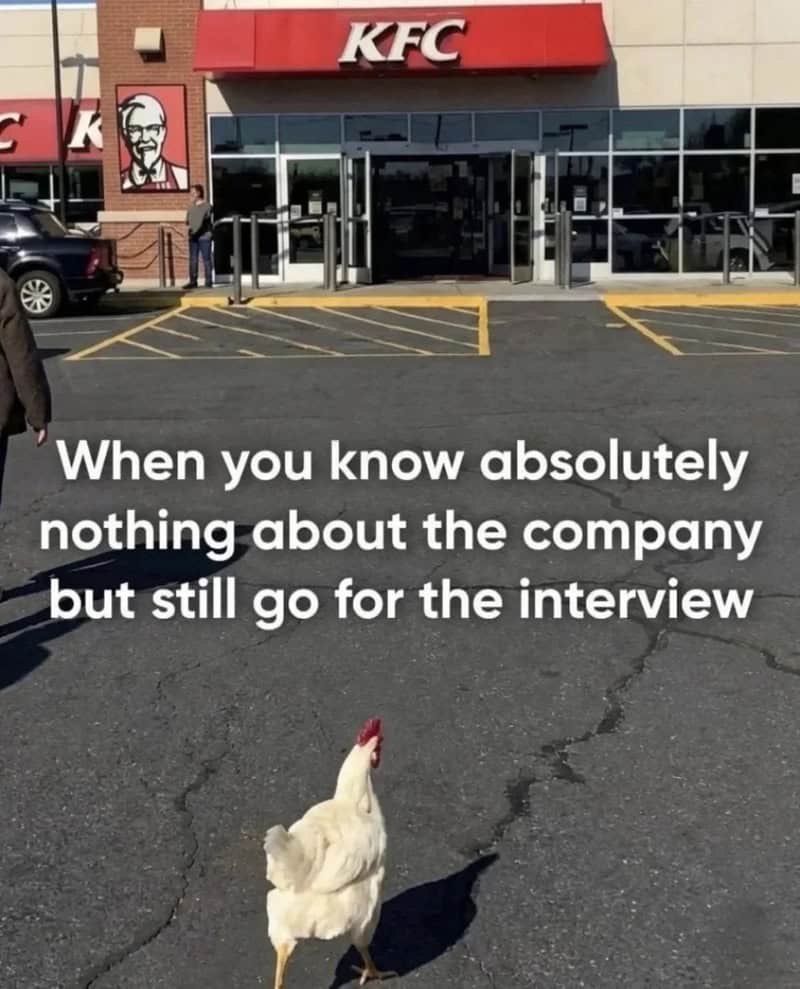 Chicken in parking lot with KFC store, caption about interview.