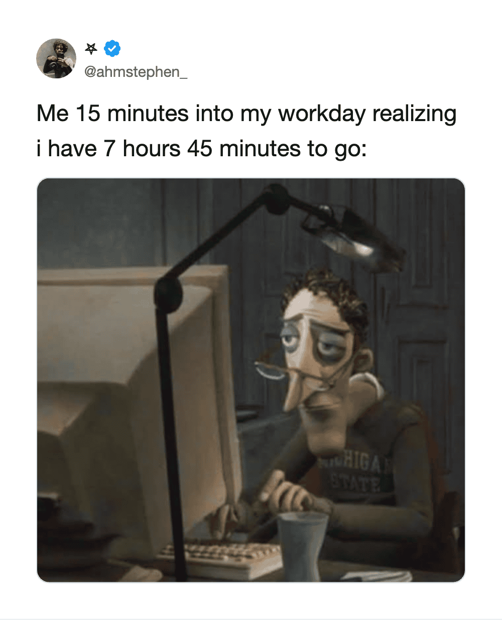 A cartoon man at a computer with tired eyes and a cigarette, looking exhausted.