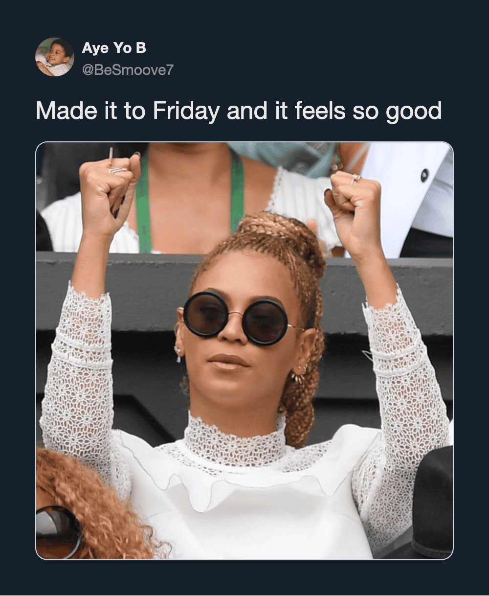 Woman with sunglasses and braided hair celebrating Friday at work.