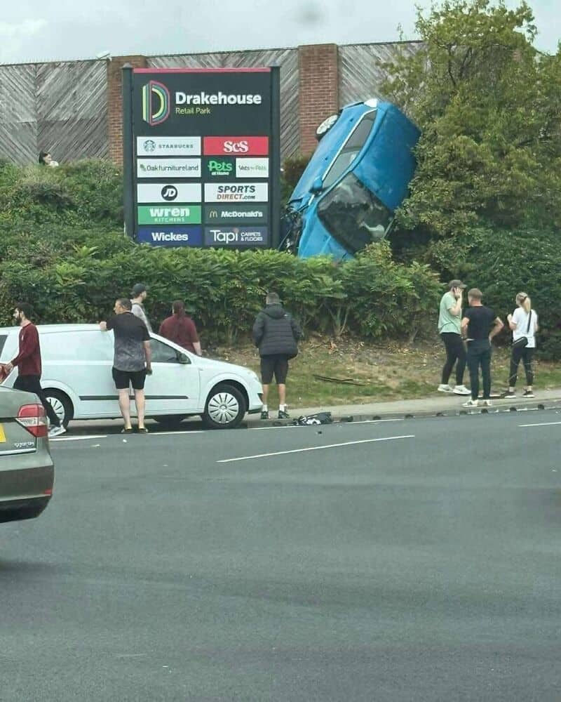 Blue car crashed into a billboard at Drakehouse Retail Park.