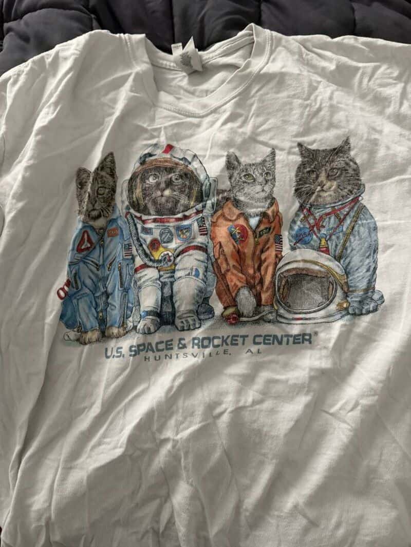 Four cats in space suits on a T-shirt, U.S. Space & Rocket Center Huntsville, AL.
