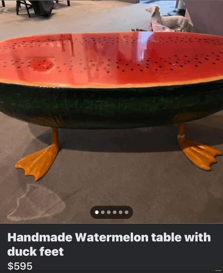 Handmade watermelon table with duck feet, priced at $595.
