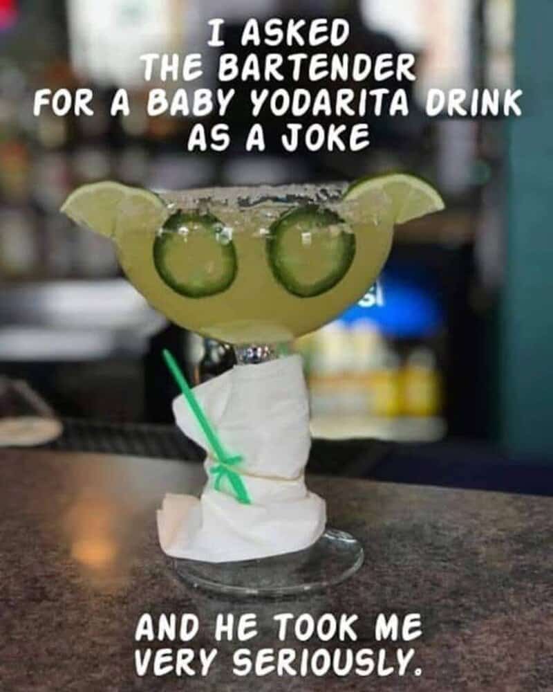 Humorous drink with lime slices and cucumber, caption about joke drink and serious bartender.
