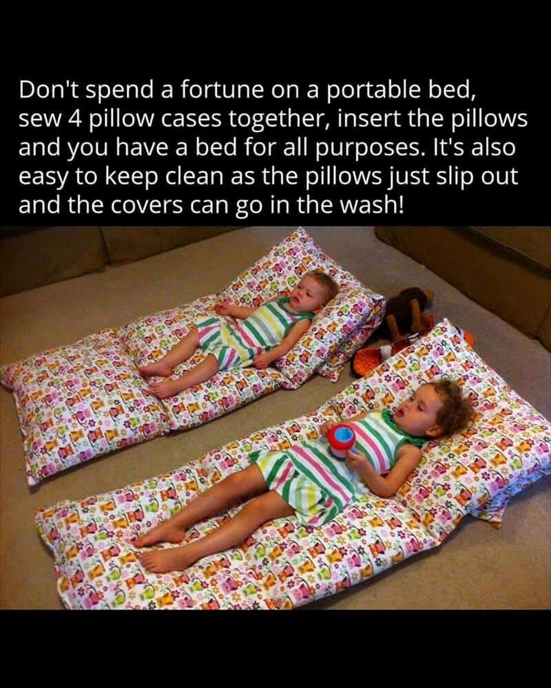 Two children lying on homemade pillow beds with colorful pillowcases.
