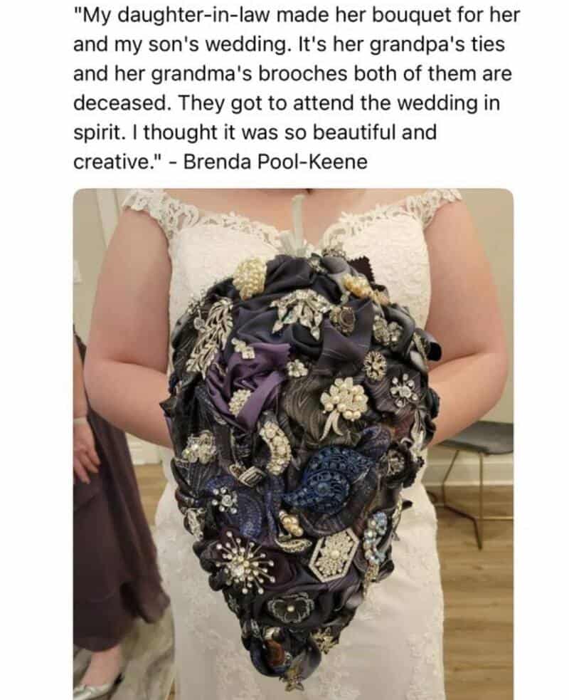 Woman in wedding dress holding a bouquet made of jewelry and fabric.