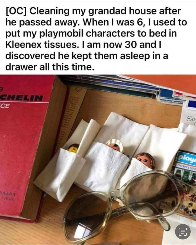 Playmobil characters kept in Kleenex tissues in a drawer, with sunglasses nearby.