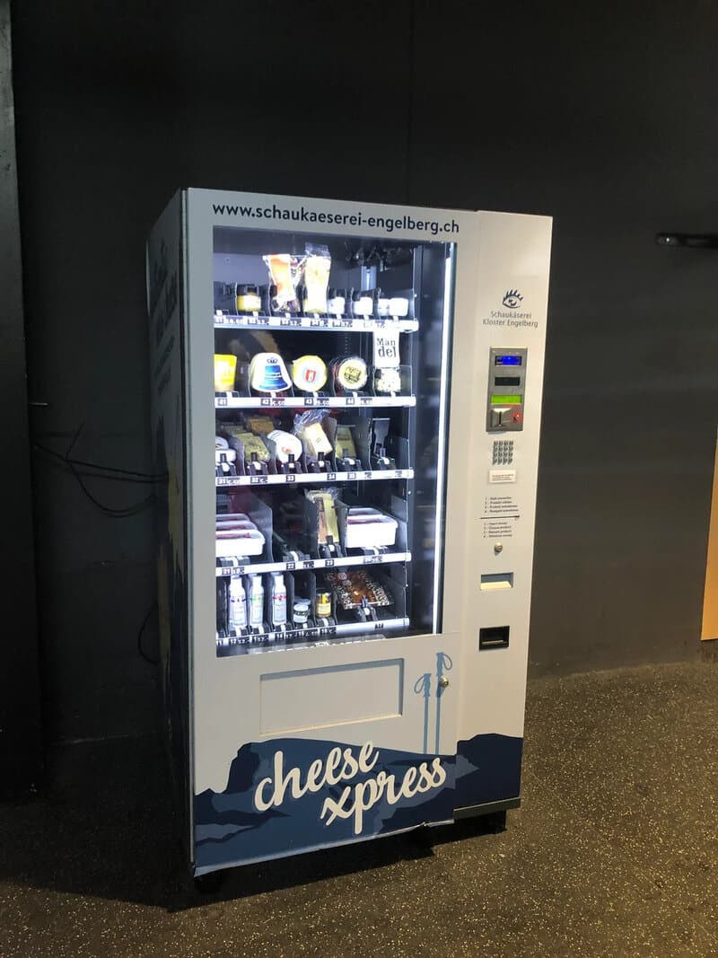 Vending machine with snacks and drinks, labeled 'chelse xpress' at the bottom.