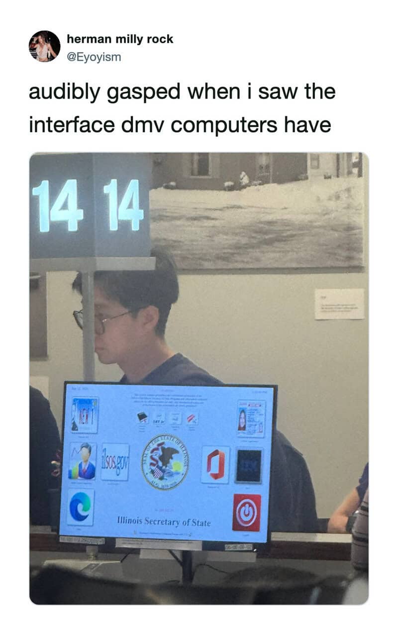 Young man at Illinois DMV with confusing interface on computer screen.