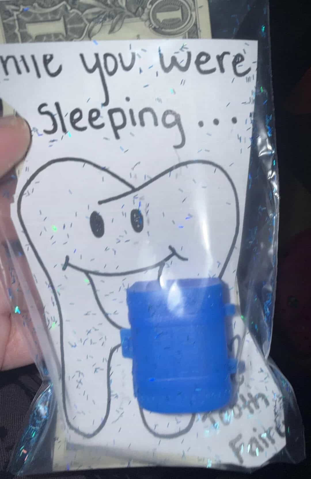 Hand-drawn smiling tooth with blue bandage, message says 'Hope you were sleeping...'.