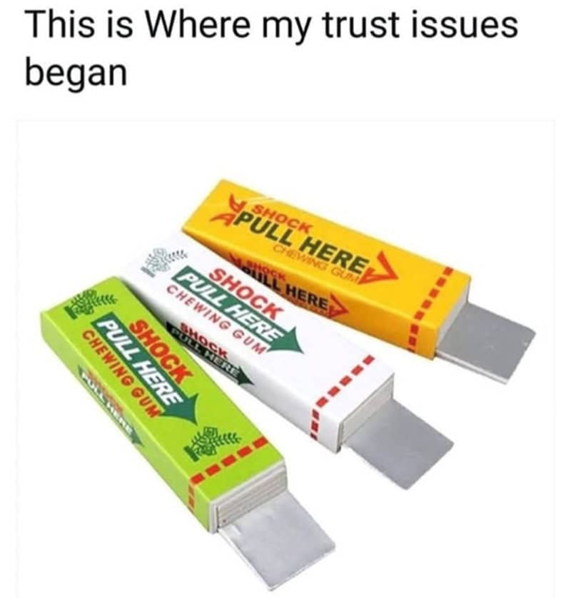 Three chewing gum packs labeled 'Shock Pull Here' in yellow, white, and green.